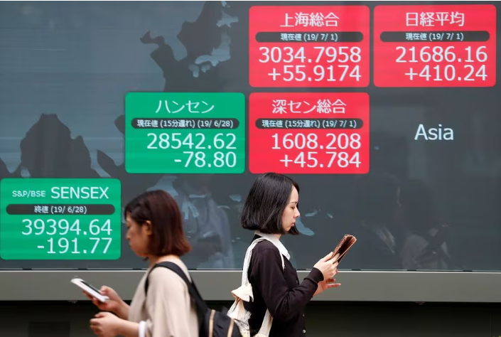 Cổ phiếu châu Á giảm điểm trước 'bữa tiệc lạm phát'