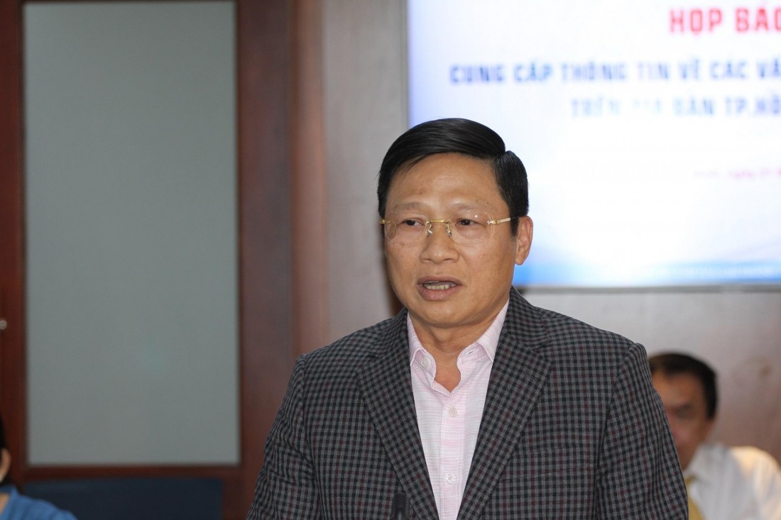 Ông Võ Minh Tuấn - Giám đốc Ngân hàng Nhà nước Việt Nam chi nhánh TPHCM - thông tin tại buổi họp báo.