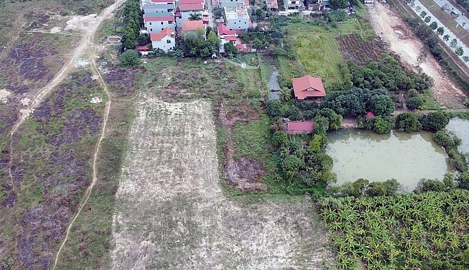 Nhiều dự án được giao đất ở huyện Mê Linh, TP Hà Nội nhưng vẫn “án binh bất động”. Ảnh Người Lao động