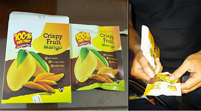 Gói ma túy “nước xoài” với dòng chữ “Crispy Fruit Mango”.