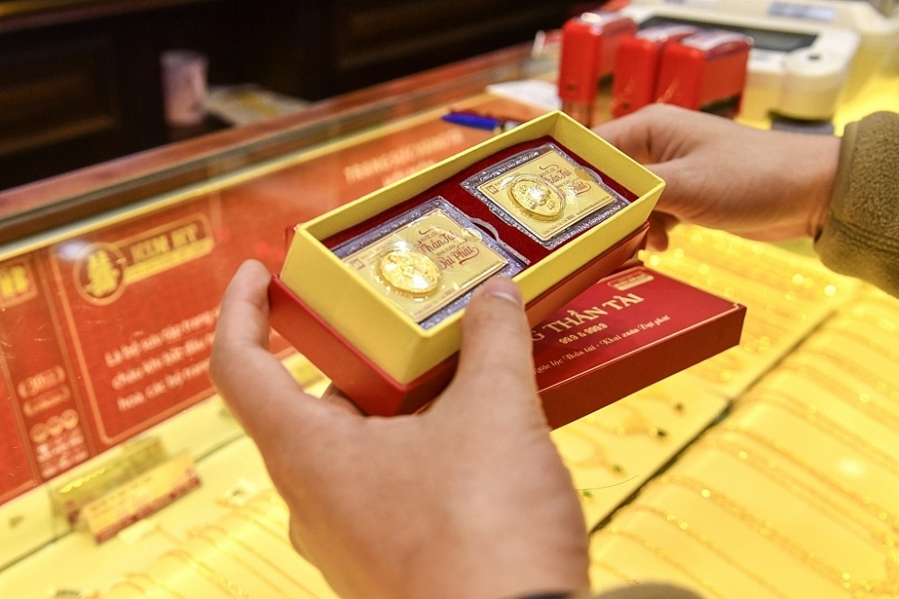 Giá vàng và tỷ giá ngoại tệ ngày 22/2: Giá vàng giảm nhẹ từ 50 - 100 ngàn đồng/lượng
