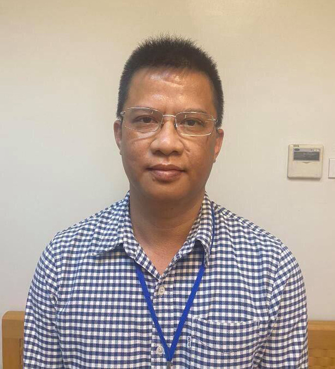 Khởi tố giám đốc Bệnh viện Bạch Mai Nguyễn Quang Tuấn - Ảnh 2.